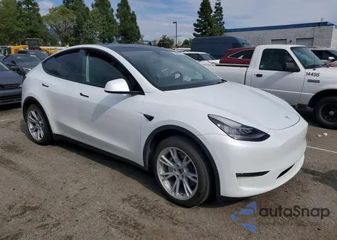 2023 Tesla Model Y from USA, damaged, VIN 7SAYGDEE3PA030132